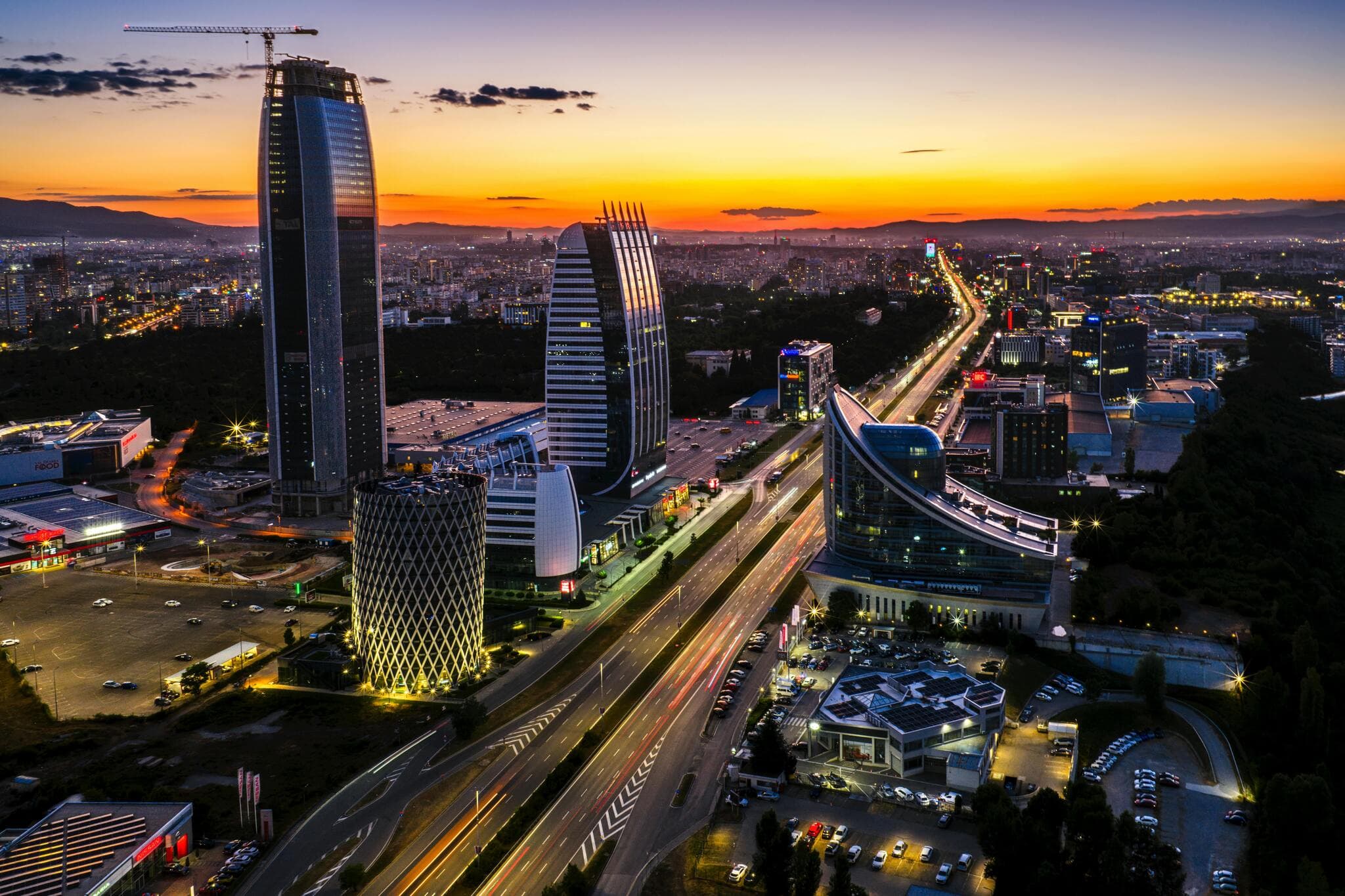 Sofia, Bulgaria business district at dusk, home of Defied Money